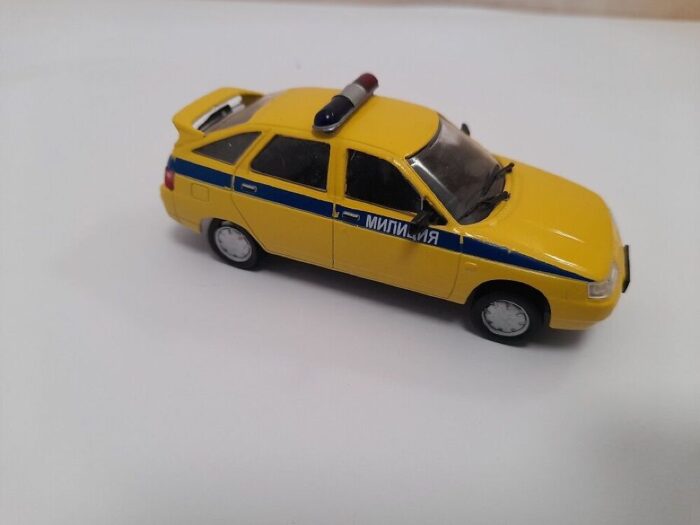 LADA 112 VAZ 2112 Miilits kollane 1/43